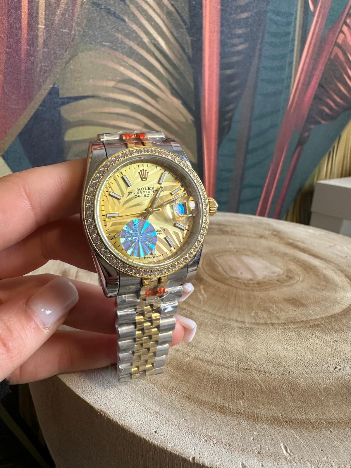 Orologio foglia gold